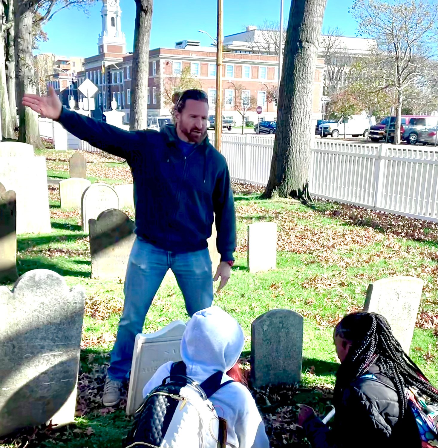 Baldwin High School science teacher Daniel Baxt explained the unique mix of human and geological history contained in the gravestones at St. George’s Episcopal Church in Hempstead.